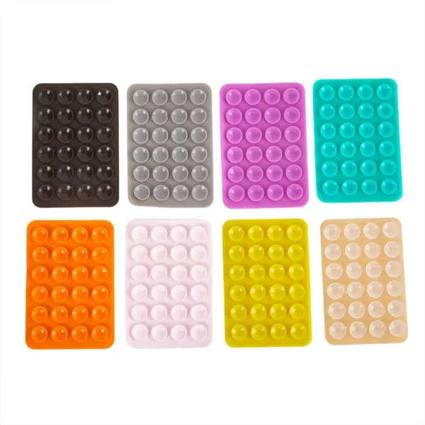 stick & grip suction cup phone holder | reusable silicone pad (random color)