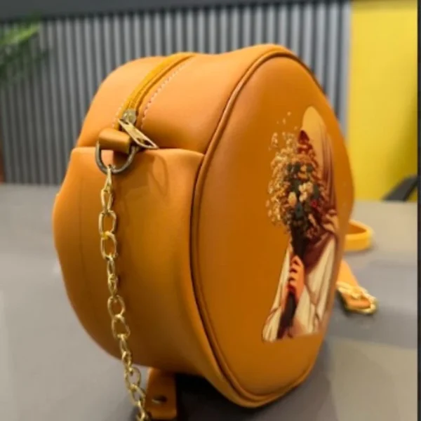 round retro crossbody handbag | stylish caramel bag with printed artwork for women