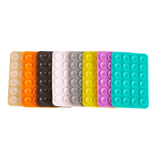 stick & grip suction cup phone holder | reusable silicone pad (random color)